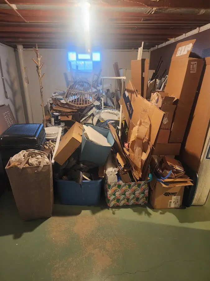 Roll-off dumpster container at job site for 15 Yard Dumpster Rental in Gulf Park Estates